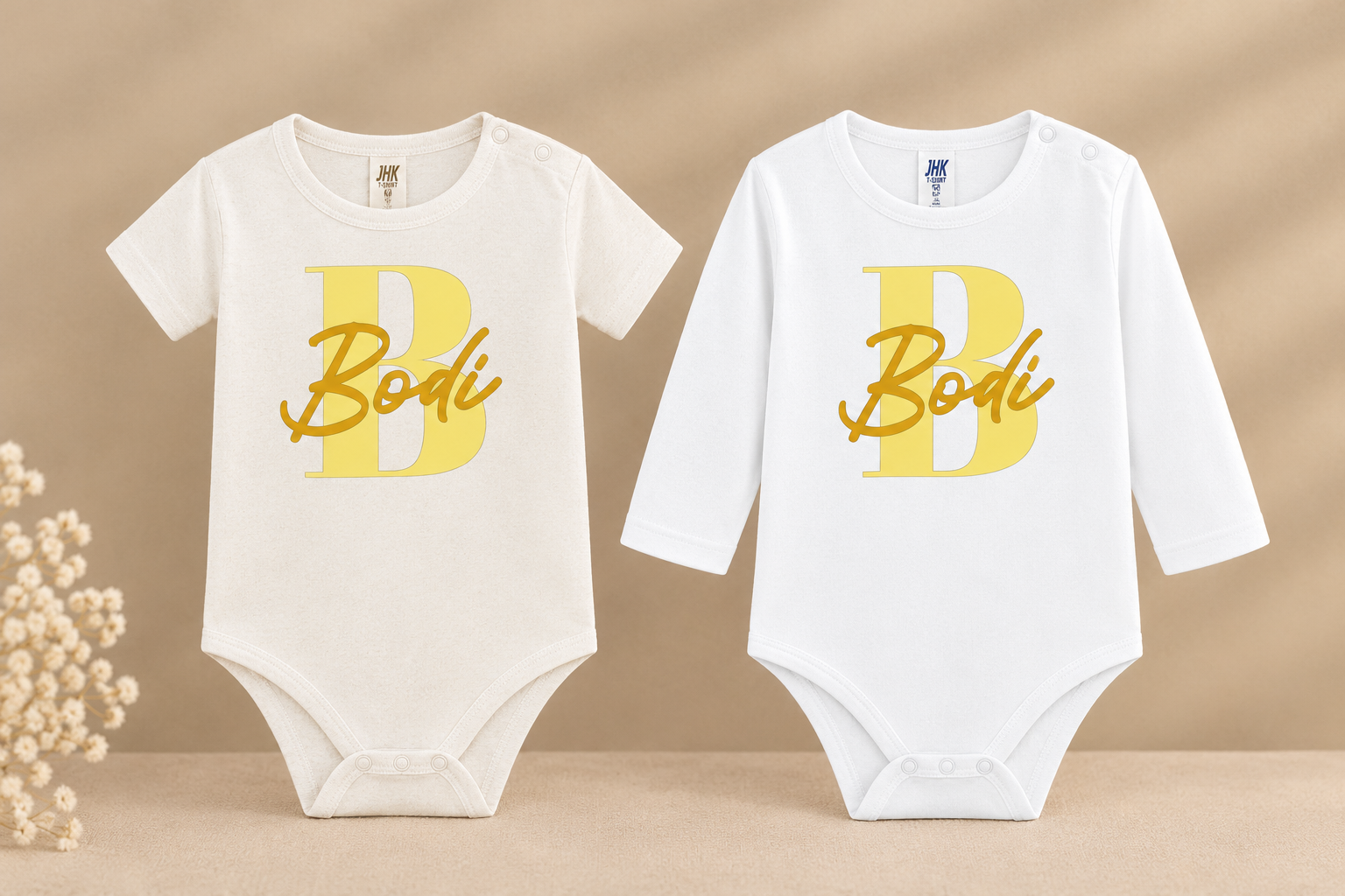 Bodi-babyrompers in zachte beige setting