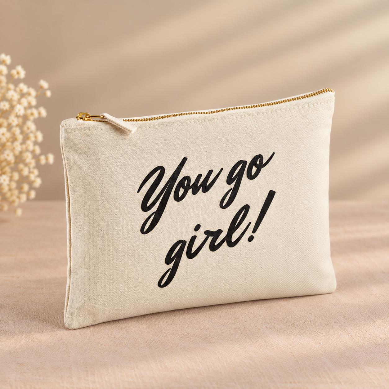 Crèmekleurig etui met gouden rits