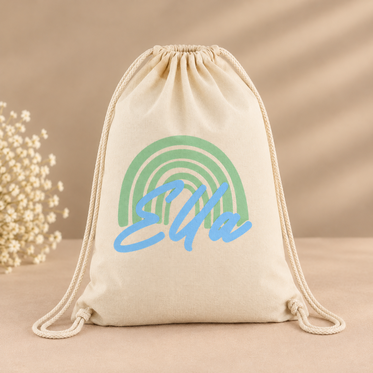 Crèmekleurige tas met regenboog en Ella-print